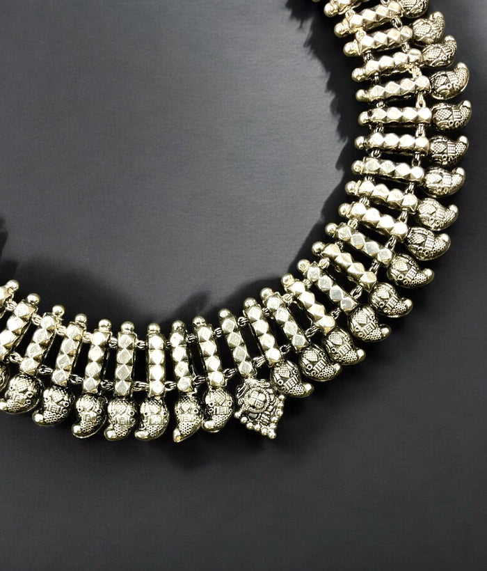The Dyuti Silver Paisley Necklace