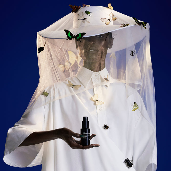 Model holding The Entomologist