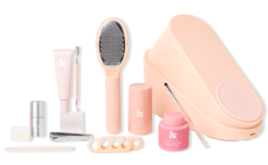 The Pedi System - One Polish with tools including foot file, nail clipper, polish brush, and toe separators for at-home pedicure care