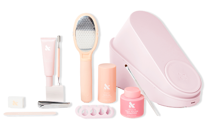 The Pedi System - Six Polishes with foot file, serum, polish remover, toe separators, and nail care tools for at-home pedicures