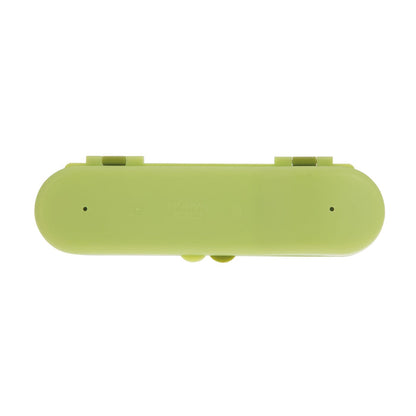 A green, oval-shaped plastic travel case from Nuby, designed to hold the Toddler Utensil Set | Dino, features two small top-edge hinges and is shown from above on a white background.
