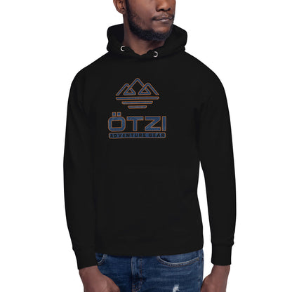 Man wearing a black Ötzi Adventure Gear hoodie with mountain graphic and logo on chest