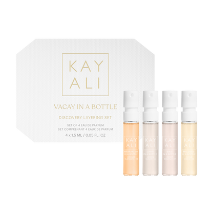 Kay Ali perfume set with four small bottles and packaging on a white background