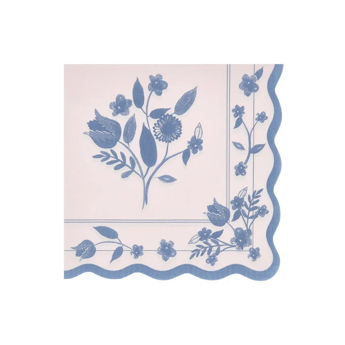 Decorative paper napkin with blue floral pattern on a white background