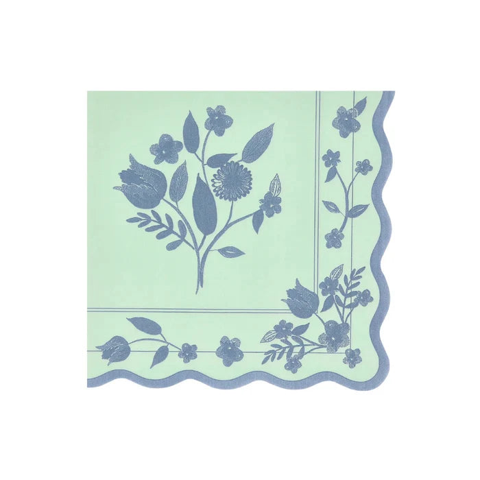 Decorative napkin with floral pattern on a light green background