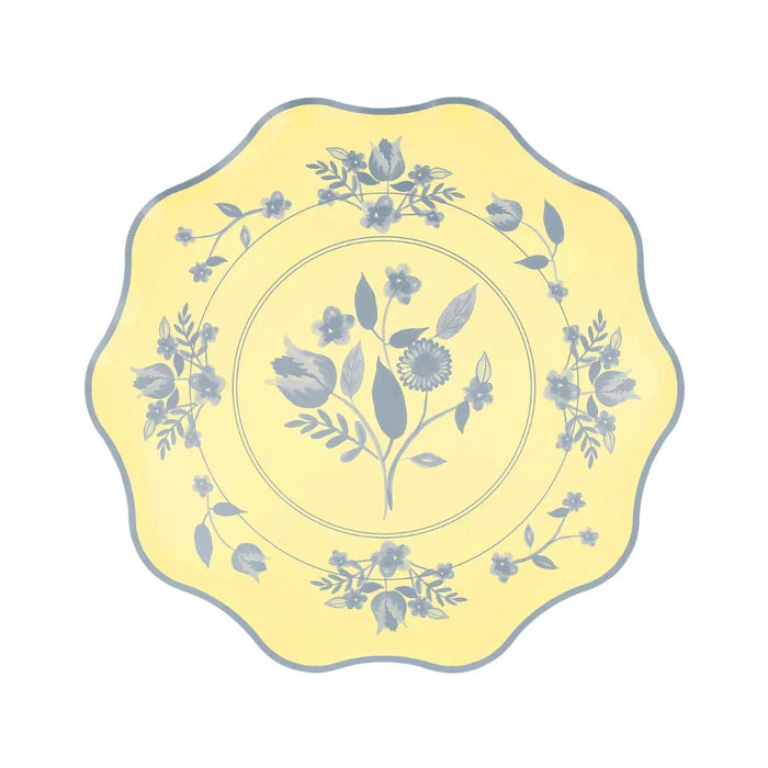 Yellow plate with floral patterns on a white background