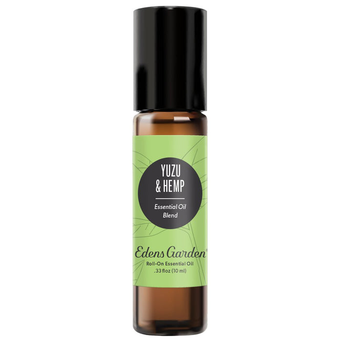 A black roll-on essential oil bottle with a label that reads 'YUZU & HEMP Essential Oil Blend' by Edens Garden.