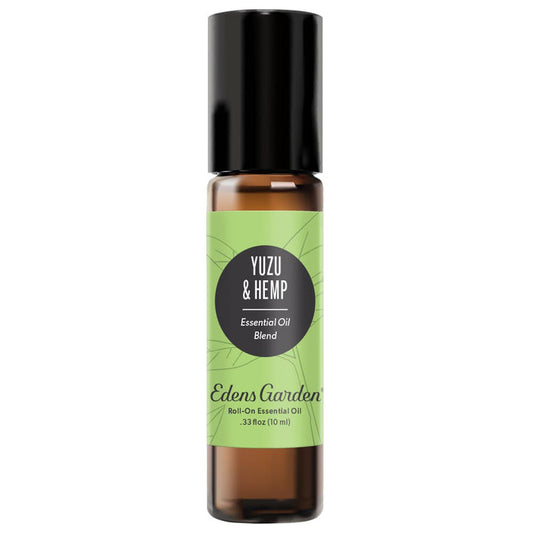 A black roll-on essential oil bottle with a label that reads 'YUZU & HEMP Essential Oil Blend' by Edens Garden.